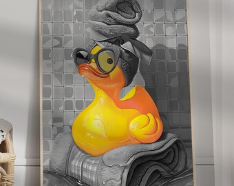 May include: A yellow rubber duck wearing sunglasses and a towel on its head, sitting on a rolled up towel in a black and white tiled bathroom.