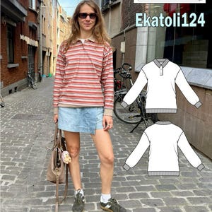 Może przedstawiać: Osoba nosząca koszulę z długim rękawem w czerwono-beżowe paski z jasnoniebieską spódnicą dżinsową. Koszula ma kołnierzyk polo. Obraz przedstawia również projekt koszuli z długim rękawem z napisem "Ekatoli124".
