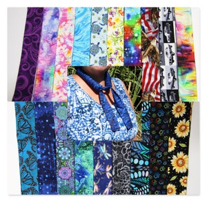 May include: A collection of colorful fabric strips with various patterns, including butterflies, sunflowers, seashells, and geometric designs. The fabric strips are arranged in rows and columns, creating a visually appealing display.