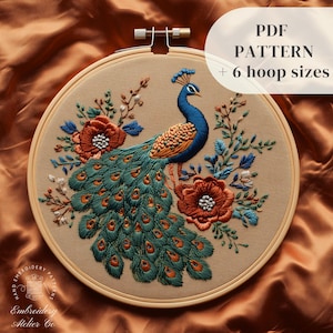 May include: Embroidered peacock with a colorful tail and floral accents in a wooden embroidery hoop. PDF pattern includes 6 hoop sizes.