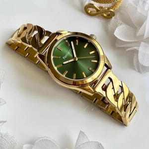Ferrucci Women’s Gold-Plated Watch - Luxurious Green Dial with Sparkling Crystal Accents and Stylish Chain-Link Strap