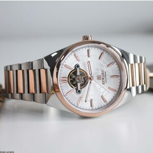 Reloj automático de lujo de dos tonos en oro rosa y plata con corazón abierto, reloj mecánico para hombre, reloj de vestir con pulsera de metal y diseño de esfera de globo