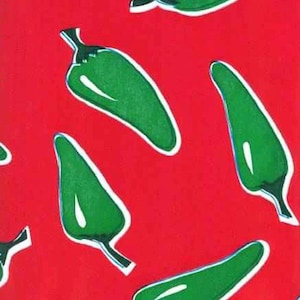 May include: A red background with a repeating pattern of green jalapeno peppers.