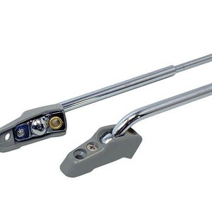 May include: Two chrome window crank handles with grey plastic bases. The handles are designed to be used in a car.