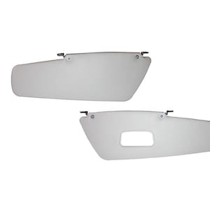 May include: Two white car sun visors. The top visor has a simple design. The bottom visor has a rectangular opening in the centre.