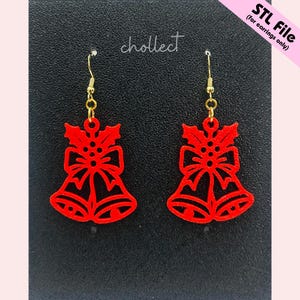 May include: A pair of red Christmas bell earrings with gold-coloured hooks. The earrings are cut-out designs with a bow and holly leaves. The text "chollect" is visible in the upper left corner. The text "STL File (for earrings only)" is in the upper right corner.