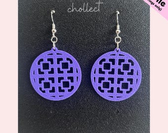 May include: A pair of purple, circular earrings with a geometric design. The earrings are suspended from silver-colored hooks. The image also includes the text "chollect" and "STL File (for earrings only)".
