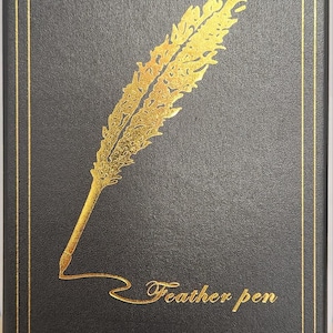 May include: Black box with a gold border and a gold feather pen design. The words "Feather pen" are written in gold script below the feather. The box has a textured surface.