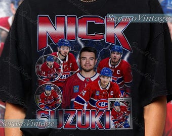 Puede incluir: Camiseta negra con un gráfico de Nick Suzuki, jugador de hockey, con una camiseta roja y azul de los Montreal Canadiens. El diseño incluye el nombre del jugador y fotos de acción. La camiseta tiene un estilo vintage.