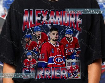 May include: Black t-shirt featuring a graphic of Alexandre Carrier, a hockey player, in a red and blue jersey. The design includes the player's name, jersey number 45, and the team logo. The shirt has a vintage aesthetic.