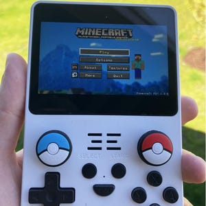 ArcadeXpress™: La consola portátil definitiva para juegos retro / Pantalla IPS de 3,5” / 64 GB de almacenamiento / Portátil y recargable