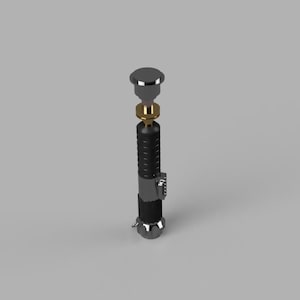 May include: A 3D-rendered lightsaber with a black, silver, and gold color scheme. The hilt is cylindrical with a ribbed texture, and the top features a circular button. The design includes a gold-colored section and a silver emitter.