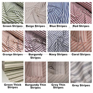 May include: A collection of twelve fabric swatches featuring various striped patterns in colors including green, beige, blue, red, orange, burgundy, navy, coral, and grey. The textiles display different stripe widths and orientations.