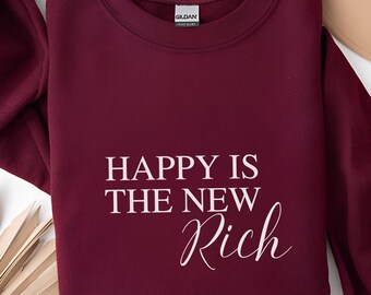 Sudadera "La felicidad es la nueva riqueza", jersey motivador y acogedor.