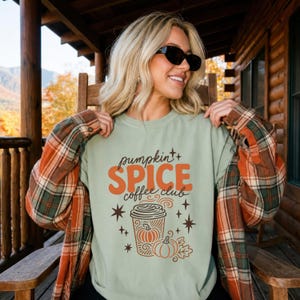 Light mint t-shirt with "Pumpkin Spice coffee club" text and coffee cup graphic.