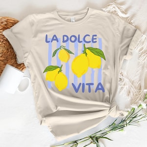 a t - shirt that says la dolce vita with lemons on it