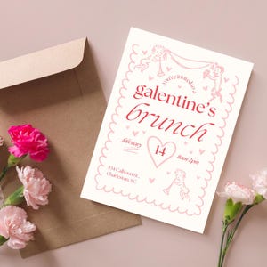 May include: A pink and white invitation card with a pink border and a red heart. The text on the card reads "You're invited to a galentine's brunch, February 14, 11am-2pm, 834 Calhoun St., Charleston, SC."