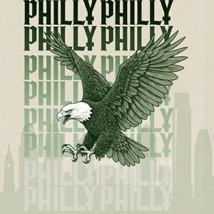 Può includere: Illustrazione di un'aquila calva in volo, con la parola "PHILLY" ripetuta in verde. L'aquila è raffigurata in verde e bianco, con una silhouette della città sullo sfondo. Il design generale ha un aspetto vintage.