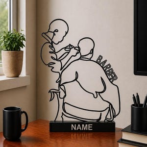 Könnte beinhalten: Eine schwarze Metalldrahtskulptur, die einen Friseur beim Haareschneiden zeigt. Das Design besteht aus einer durchgehenden Linien-Silhouette, wobei das Wort BARBER in den Umhang des Kunden integriert ist und das Wort NAME auf dem Sockel steht.