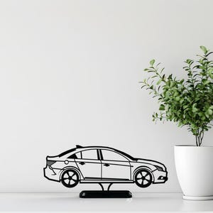 Escultura de sedã compacto impressa em 3D: decoração minimalista para automóveis