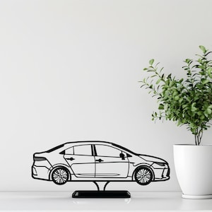 Escultura de sedã compacto impressa em 3D: decoração minimalista para mesa