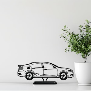 Impressão 3D de sedã compacto esportivo: decoração elegante para mesa de entusiasta de carros