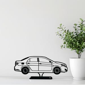 Escultura de sedã compacto impressa em 3D: decoração minimalista para mesa