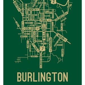 May include: A green and gold map of Burlington, Vermont, with street names and numbers. The map is surrounded by a white border.