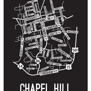 May include: A black and white map of Chapel Hill, North Carolina, with street names and highway numbers. The map is in a minimalist style with white text on a black background.