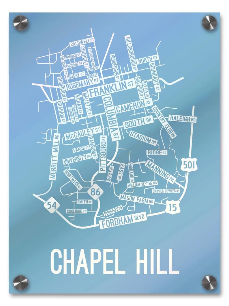 May include: A blue and white map of Chapel Hill, North Carolina, with street names and numbers. The map is on a blue background with a white border.
