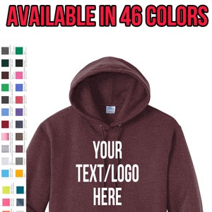 May include: A maroon hoodie with a hood and a front pocket. The text "YOUR TEXT/LOGO HERE" is printed in white on the front. The image also displays a color chart with 46 color options. The text "AVAILABLE IN 46 COLORS" is at the top.