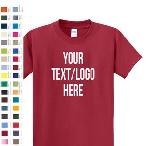 May include: A red t-shirt with the text "YOUR TEXT/LOGO HERE" printed in white on the front. The shirt is available in 52 colors.