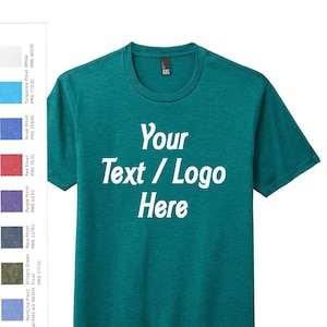 May include: A teal green t-shirt with the text "Your Text / Logo Here" in white.