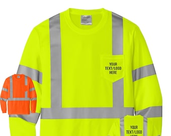 May include: A bright yellow long-sleeve shirt with reflective silver stripes. The shirt has a pocket on the left chest with the text "YOUR TEXT/LOGO HERE".