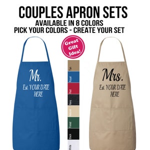 May include: A set of two personalized aprons, one blue and one tan, with the words "Mr." and "Mrs." and the text "Est. YOUR DATE HERE". The aprons are available in eight colors.