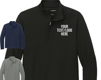 May include: Black, navy blue, and gray long-sleeve shirts with a mock neck and zipper closure. The shirts have a white embroidered design that says "YOUR TEXT/LOGO HERE".
