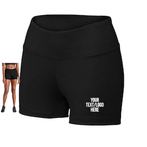 May include: Black athletic shorts with a high waist and a white text overlay that says "YOUR TEXT/LOGO HERE".