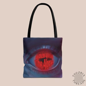 Gaze Into the Abyss philosophy quote glowing eye Tote Bag
