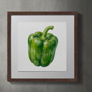 May include: Watercolor painting of a vibrant green bell pepper. The artwork is framed in a dark brown wooden frame, set against a neutral gray background. The pepper is the focal point, showcasing its natural shape and color.