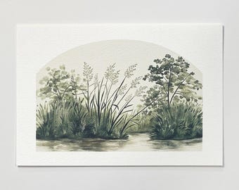 May include: A watercolour painting on textured paper depicting a landscape scene with a calm body of water in the foreground. The composition features lush green grasses, tall reeds, and leafy trees arranged within a soft, arched frame design.