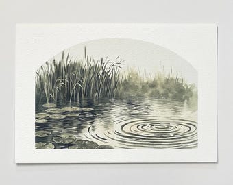 May include: A monochromatic watercolour painting on textured paper depicting a tranquil pond scene. The artwork features tall reeds, floating lily pads, and concentric ripples on the water surface, all rendered in shades of muted grey and green.