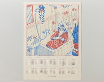 May include: A 2027 calendar print featuring a blue and red line art illustration of a cat wearing a towel on its head and a robe while sitting in a bathtub holding a cup. The bathroom scene includes a sink, shower head, hanging plant, and goldfish.