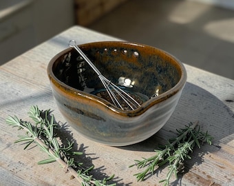 Combination herb stripper, dressing bowl and garlic grater. Hand thrown ceramic.