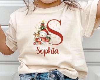 Personalized Christmas Kids Shirt, Custom Name Reindeer Toddler Tee, Holiday Santa Hat Outfit, Family Matching Xmas Shirt, Gift For Children