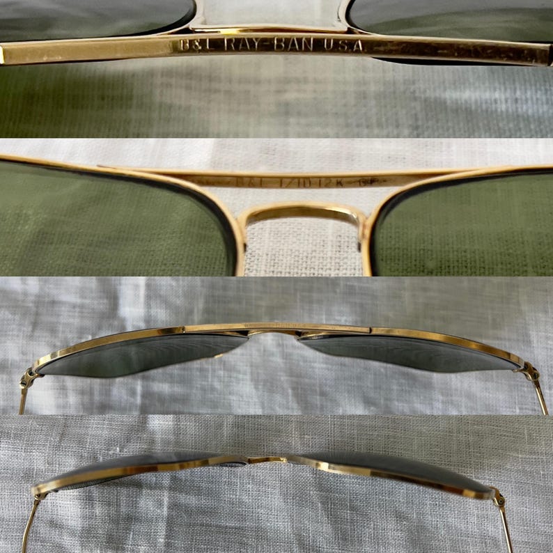 May include: Close-up of gold-rimmed sunglasses with green lenses. The text "B&L RAY-BAN USA" is visible on the frame. The sunglasses have a classic aviator style. The lenses are a muted green color, and the frames are a shiny gold.