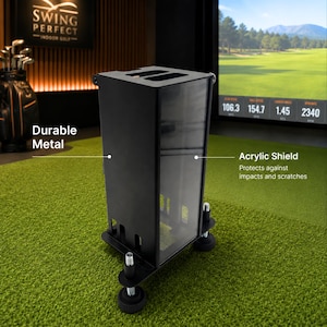 May include: A black metal protective enclosure for golf launch monitors featuring a transparent acrylic front shield, a rectangular frame with side ventilation cutouts, and four adjustable leveling feet for stability on flat surfaces.