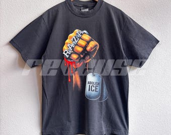Camiseta de protesta "Abolish ICE": camisa con colores reconfortantes por los derechos de los inmigrantes