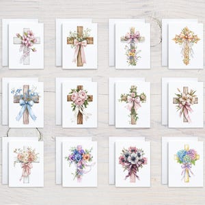 May include: A collection of watercolor greeting cards featuring crosses adorned with floral arrangements and ribbons. The crosses are depicted in various styles, with flowers in shades of pink, blue, purple, and white. Each card is paired with a white envelope.