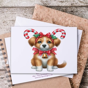 May include: A Christmas card featuring a cartoon puppy with brown and white fur, wearing a red bow, a bell, and candy cane antlers. The card is on a white envelope, resting on a spiral notebook and a corkboard.