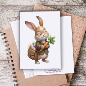 May include: An Easter greeting card featuring a cartoon rabbit in a brown suit, carrying a carrot and a satchel filled with colorful Easter eggs. The card is on a wooden surface with a spiral notebook and a corkboard.